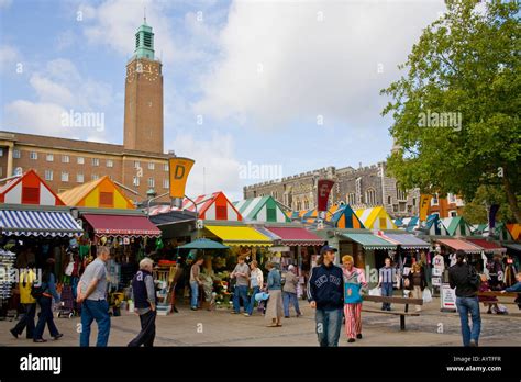 Norwich Market With Colourful Market Stalls Showing Norwich City Hall