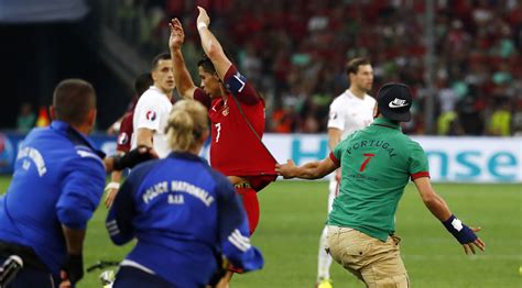 See you in next video. Free hugs for Ronaldo? Fan breaks onto pitch amid Portugal ...