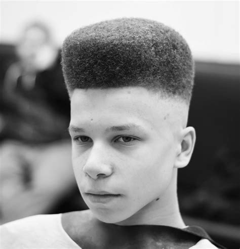Geometric flat top + fade + hard part haircut for boys. 35 Popular Haircuts For Black Boys: 2021 Trends