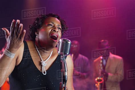 Black Woman Singing On Stage With Jazz Band Stock Photo Dissolve