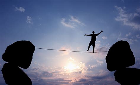 Man Balancing On The Rope Stock Photo Download Image Now Istock