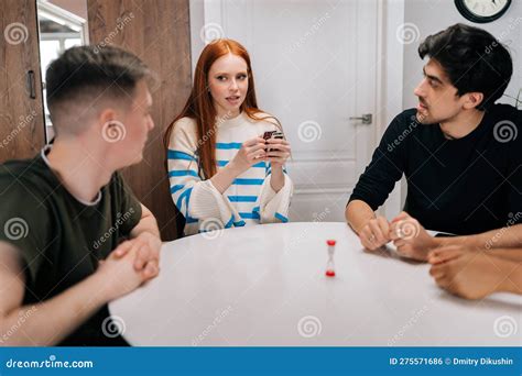 Happy Multiethnic Friends Having Play Cards Games For Time Enjoying