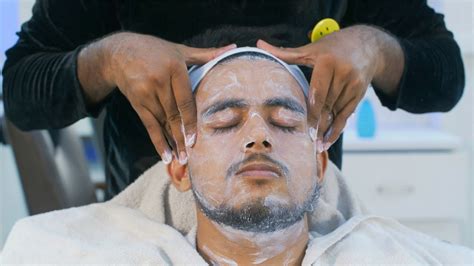 A Young Boy Man Getting A Face Massage At A Salon Indian Stock