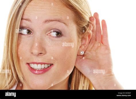 A Young Woman Keeps With Listen The Hand Behind The Ear Eine Junge
