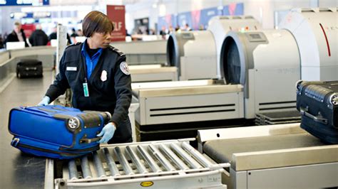 Checked baggage fees are lowest during initial flight booking. Why do airport luggage handlers flip suitcases upside down ...