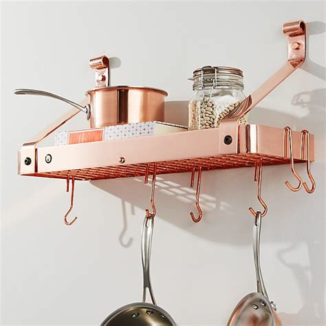 Mounted from the ceiling, under cabinetry, or against a wall, they bring organization and style to a kitchen. Enclume ® Copper Bookshelf Pot Rack | Crate and Barrel