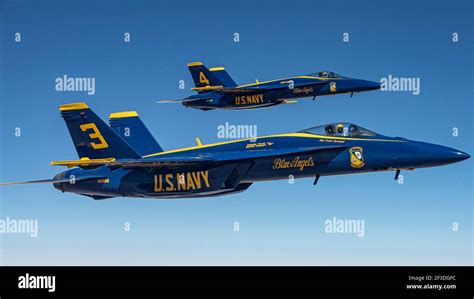 The Us Navy Blue Angels Flying Fa 18 Super Hornet Fighter Jets In