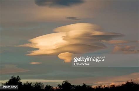 White Lenticular Clouds At Sunrise Lenticular Clouds Are Stationary
