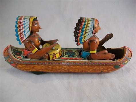 vintage fine toys indians in canoe lithographed tin toy rare japan tin toys old toys vintage