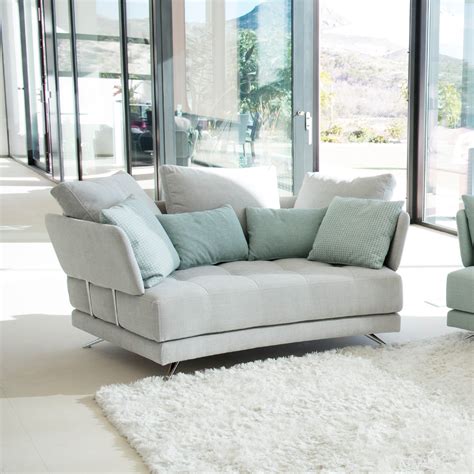 The sofa is great for a small room to provide an extra sleep space. Fama Pacific Curved 2 Seater Sofa - Fabric Sofas - Cookes ...