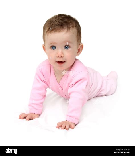 Baby In Pink Crawling On White Sheet Stock Photo Alamy