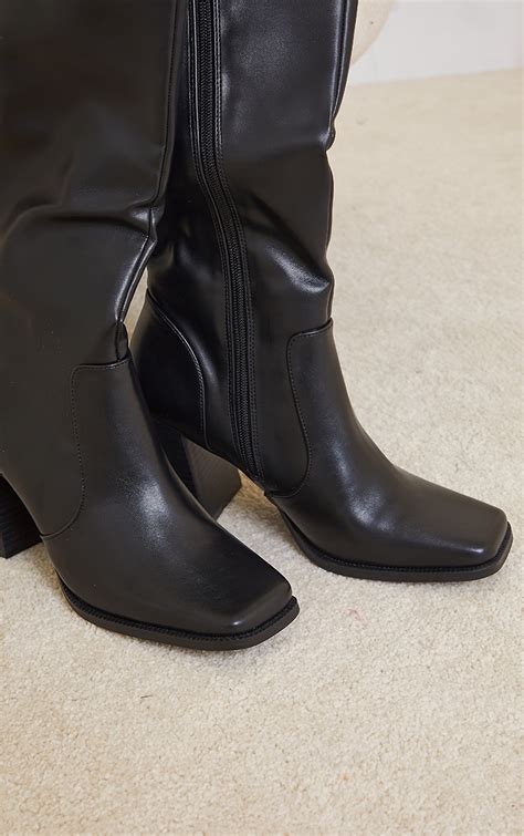 black flare block heel knee high boots prettylittlething usa