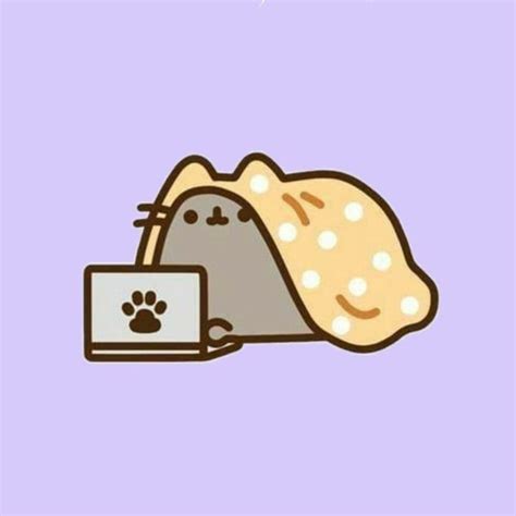 A Cat Sleeping Under A Blanket Next To A Laptop On A Purple Background