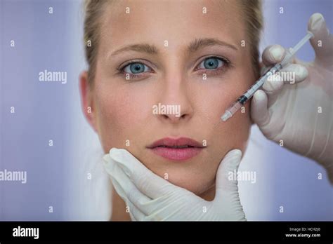 Female Patient Receiving A Botox Injection On Face Stock Photo Alamy