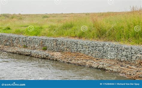 Gabion Retaining Walls On The Bank Of A River Stock Photo Image Of