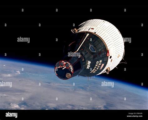 The Gemini 6 Space Capsule In Earth Orbit Viewed By Astronauts Wally