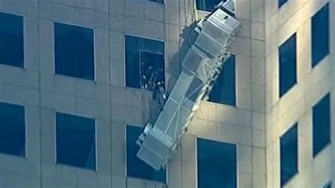 Two Workers Are Rescued From Broken Scaffold Lift Outside 20th Floor Window Of New York Building