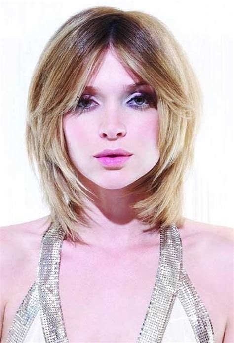 Perk up its glam finish by painting the tresses with a platinum blonde hue. Bob Cuts for Round Faces