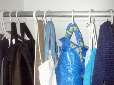 Slip the wide end of the hook over the rod, then hang your purse. 19 Easy Decluttering Tips to Improve Feng Shui and Your ...