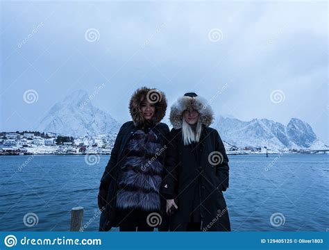 Women Posing In The Mountains Of The Lofoten Islands