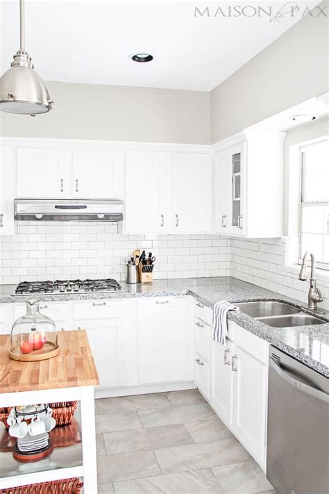 #off white kitchen cabinets with tile floor #white cabinets tile floor kitchen #white kitchen cabinets dark tile floor #white kitchen outdoor interlocking plastic floor tiles. Classic White Kitchen - Maison de Pax