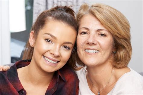Portrait Of Mature Mother With Teenage Daughter Stock Photo Image Of