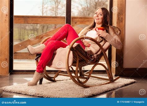 woman sitting on chair relaxing at home stock image image of room leisure 77518487