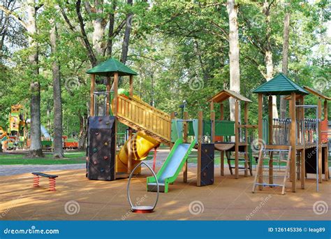 Colorful Playground With Swings And Slides Stock Photo Image Of