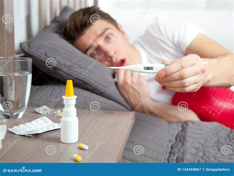 Man Feeling Bad Lying In The Bed And Coughing Stock Image Image Of