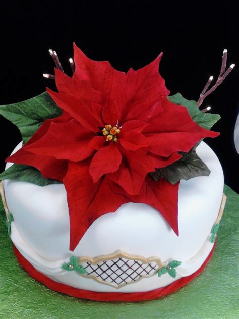 Learn how to make fondant cakes and other decorations with fondant at wilton. Gumpaste Poinsettia On Lighted Cake - CakeCentral.com