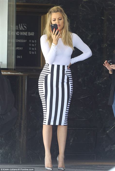 Khloé Kardashian Stuns In Striped Pencil Skirt After Revealing James