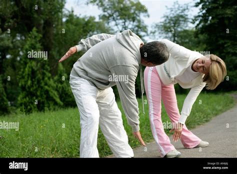 Mature Couple Stretching Stock Photo Alamy