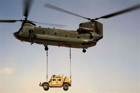 An Mh 47 Chinook Helicopter Lifts A Humvee Into The Nara And Dvids