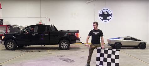 Tiny Tesla Cybertruck Smokes The Wheels Off A Ford F 150 In Insane Tug