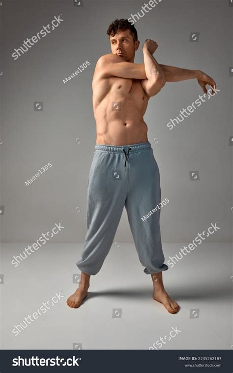 Stretching Hands Mature Muscular Man Relief Stock Photo 2245262187