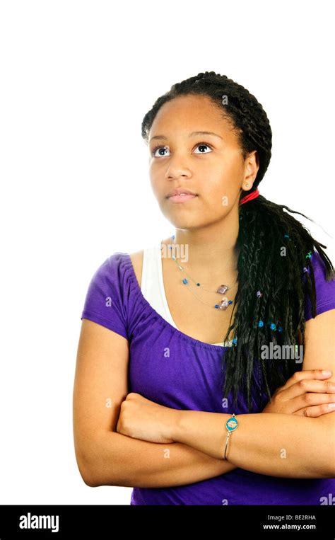 Isolated Portrait Of Black Teenage Girl With Arms Crossed Stock Photo