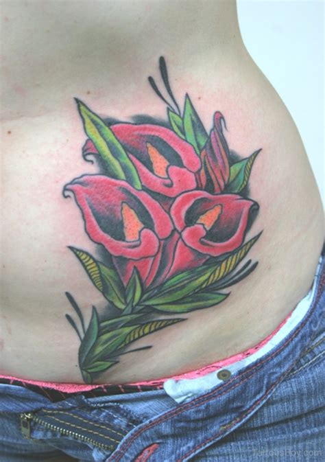 Lower back is the canvas for a horizon of tattoos. Calla Lilies Tattoos | Tattoo Designs, Tattoo Pictures