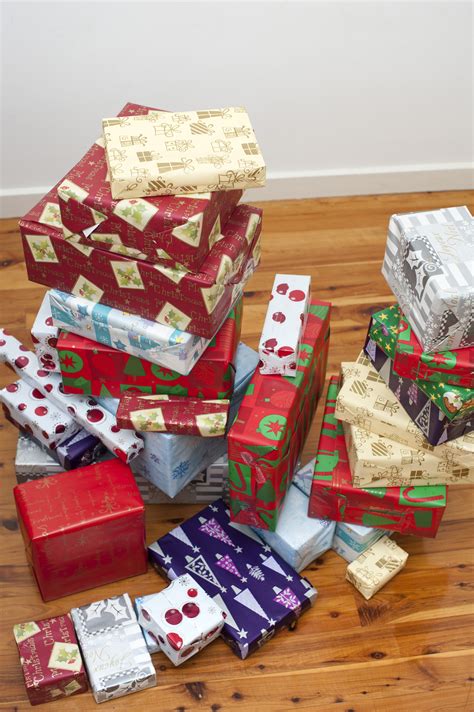 Photo of Collection of colourful gift wrapped Xmas presents | Free ...