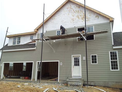 Never install your james hardie siding planks in an area where it will be subjected to standing water. Siding and Roofing - East Coast Construction and ...