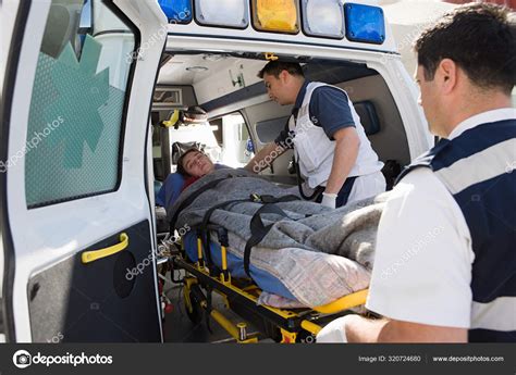 Ambulance Staff Patient Stretcher Stock Photo By Imagesource