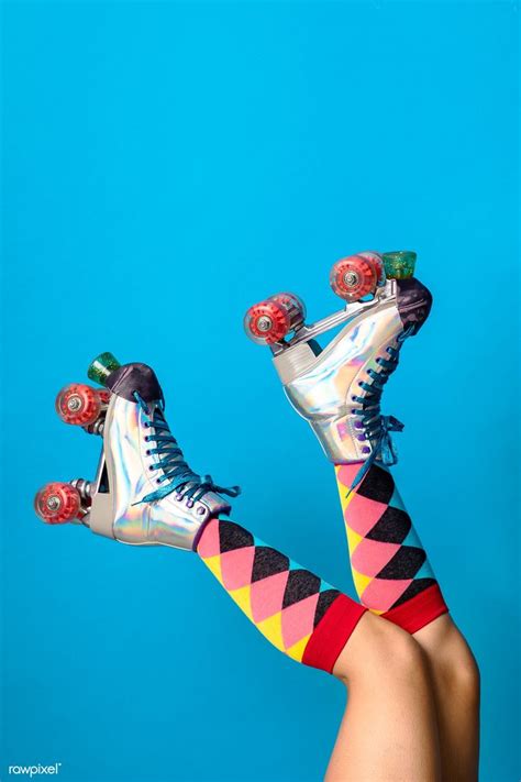Feminine Legs In A Roller Skates Shoes With Blue Background Premium