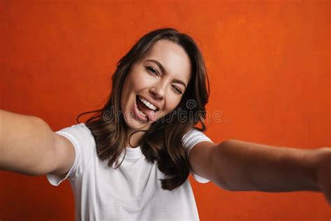 Amusing Beautiful Girl Showing Her Tongue While Taking Selfie Photo Stock Image Image Of