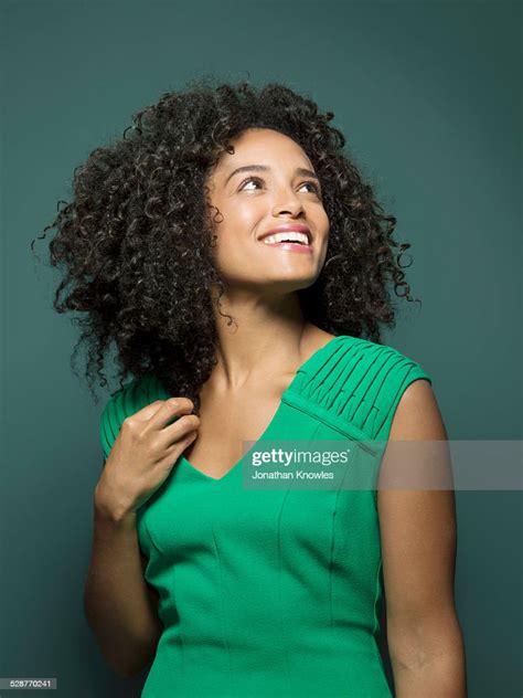 Dark Skinned Female Looking Up Smiling Photo Getty Images