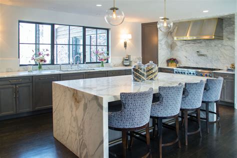 And an antiqued white sanded and distressed finish over hardwood solids and engineered wood. Waterfall Kitchen Island - Eurocraft Granite and Marble