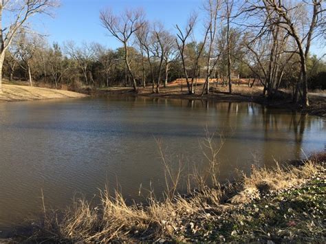 One step better in terms of dirt moved over a distance is using the spoils to build a dam around the hole, but that ensures you won't have drainage feeding the lake (sounds like the making of a mud hole). Show me your under 1/2 acre ponds! - Pond Boss Forum