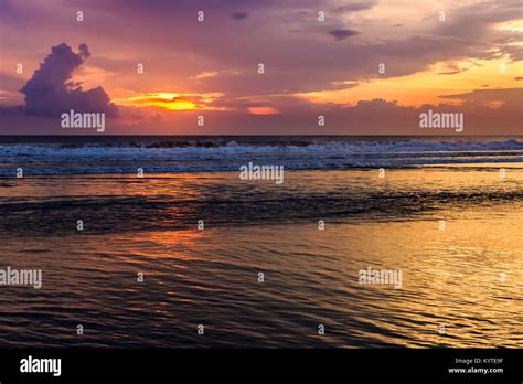 Magic Dramatic Unreal Sunset In Kuta Beach Bali Indonesia Stock Photo