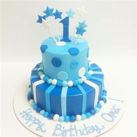 So obviously baking a good birthday cake for your boy will make him feel happy. Blue 1st Birthday - Colors, Layers, Patterns - Birthday Cakes - Decorated Cakes
