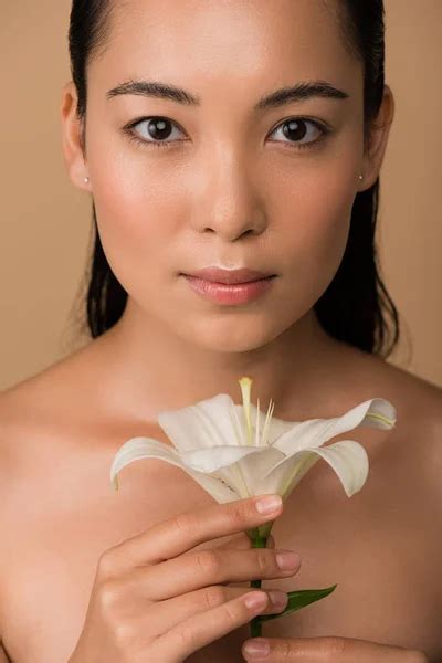 Beautiful Naked Asian Girl White Lilies Looking Away Isolated Beige Stock Photo By VitalikRadko