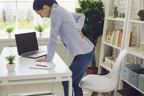Woman Suffering From Lower Back Pain Due To Kidney Disease On Copy