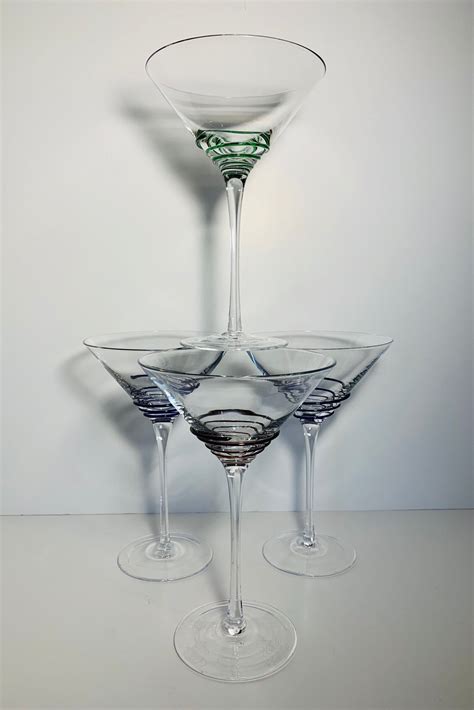 unusual set of hand blown mexican glass martini glasses with mulit colored feet and irregular